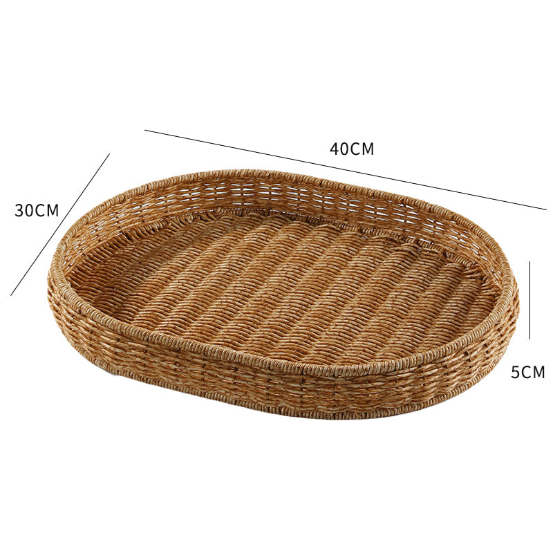 Panier en rotin tressé à la main pour fruits ou pain japonais, fabriqué par RENFAN, avec une texture artisanale visible.