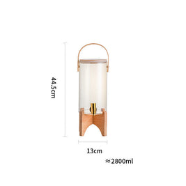 Distributeur de boisson en wenge de la marque PREMIUM GOODS, en bois foncé avec compartiments pour boissons.