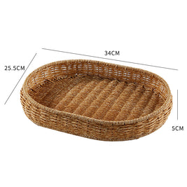 Panier en rotin pour fruits ou pain japonais, tressé à la main par RENFAN, avec une texture artisanale visible.
