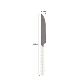 Couverts VidaXL Athenes en acier inoxydable, fourchette, couteau et cuillère, présentation élégante sur une table.
