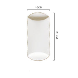 Assiettes en céramique VidaXL Ilé-Ifè, élégantes et durables, avec motifs traditionnels colorés sur fond blanc.