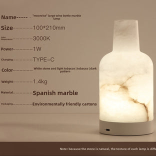Lampe portable en marbre espagnol Cantoria avec base en marbre blanc et ampoule intégrée, style élégant et moderne.