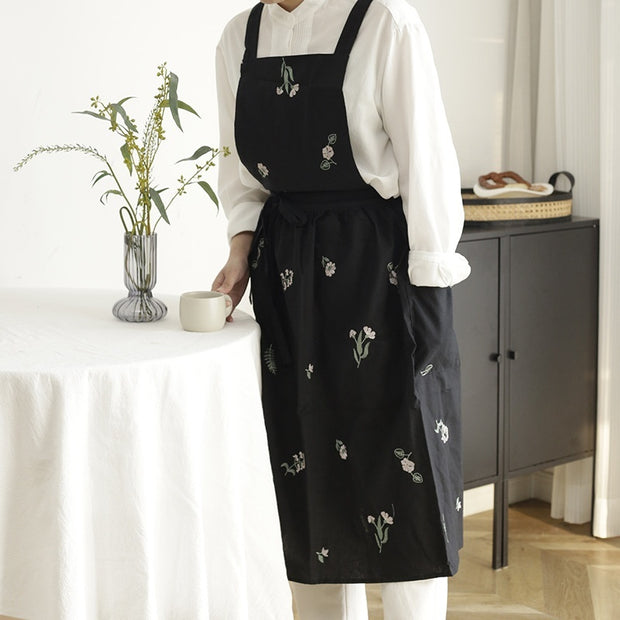 Tablier de cuisine HAUSSLYON de couleur neutre avec liens en tissu, conçu pour protéger lors de la cuisine.