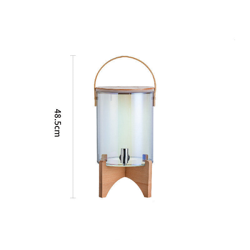 Distributeur de boisson en bois wenge de la marque Premium Goods, élégant et robuste, avec un robinet pour verser des boissons.