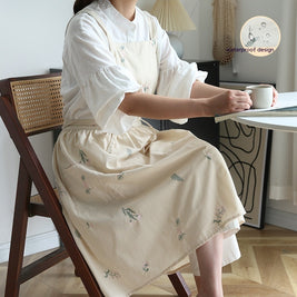 Tablier de cuisine HAUSSLYON, robuste en tissu, avec liens réglables, idéal pour cuisiner et protéger les vêtements.