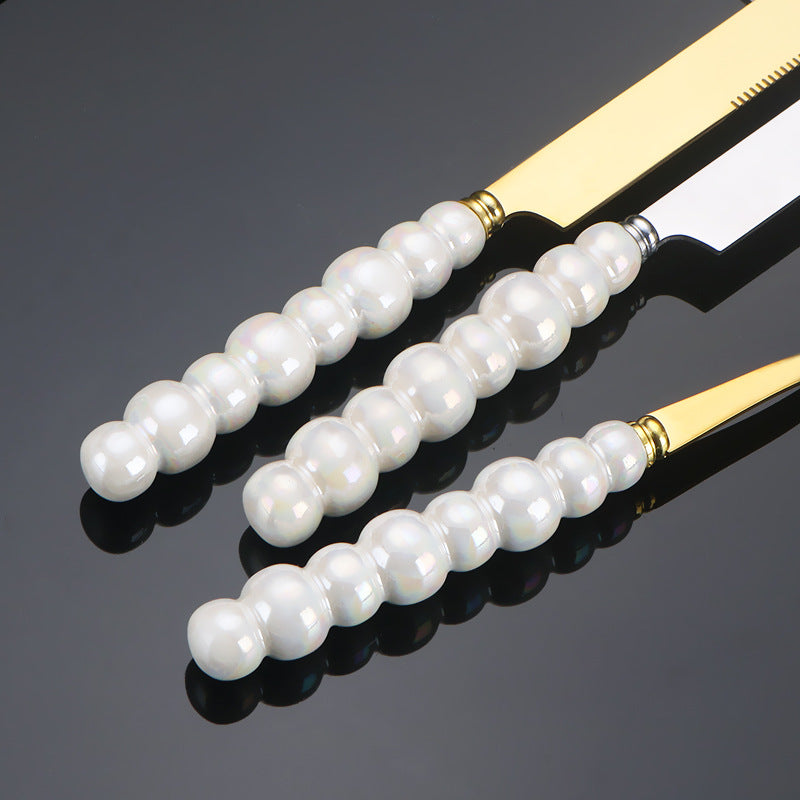 Spatules VidaXL Athenes en acier inoxydable, poignée ergonomique pour la cuisine ou la pâtisserie, vue de face.