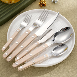 Couvert en acier inoxydable Hauslyon, set de 4 pièces, design moderne et élégant pour repas quotidiens ou occasions spéciales.