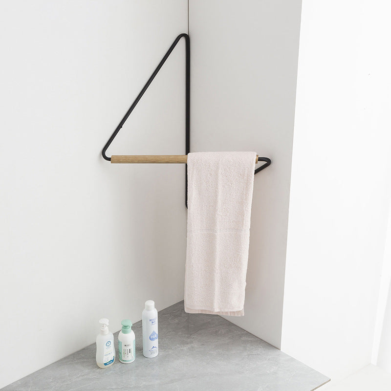 Étagère d'angle murale en fer et bois pour vêtements, design élégant, fixation murale, finition en métal noir et bois naturel.
