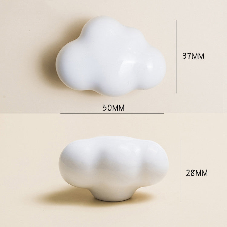 Boutons Cloudy de VidaXL, boutons de meuble blancs crème avec finition élégante, visibles sur cette image.