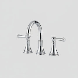 Robinet de salle de bain Hauslyon Lorraine avec poignée moderne, en chrome brillant, installé sur lavabo blanc.