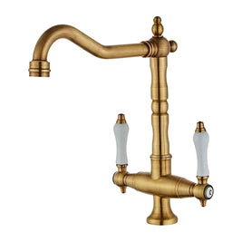 Robinet de cuisine Hausslyon Montmorency II avec poignée en chrome et bec flexible, installé sur un évier de cuisine moderne.
