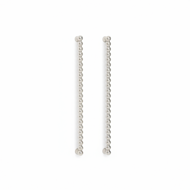 Poignées et boutons Nairobi en chrome de VidaXL, montrant leur finition brillante et leur design élégant pour meubles.