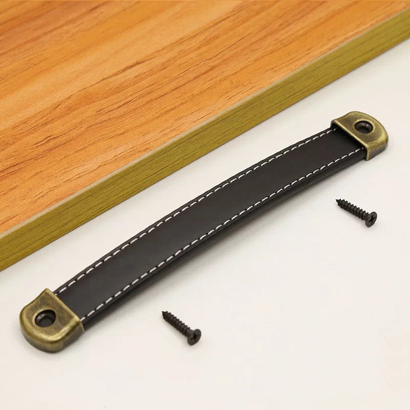 Poignées Roanne VidaXL noires en métal, design simple et moderne, pour meubles ou portes, visibles en détail sur l'image.