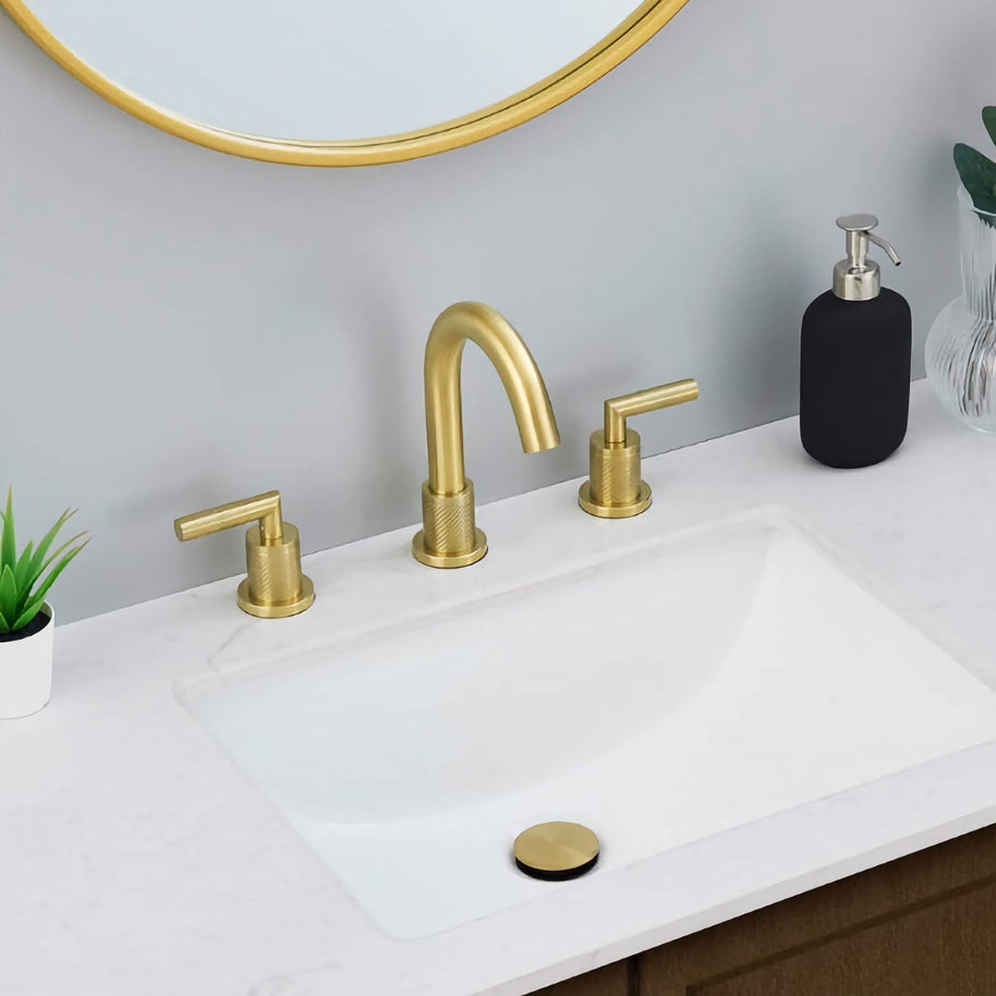 Robinet de salle de bain New York de VidaXL, design moderne, finition en or, avec poignées et bec pour lavabo.